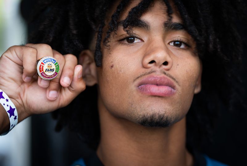Brysen Wright, a member of the Jaguars Elite 14U, shows off the championship ring that the team won at the NFL Flag Championships at the Pro Football Hall of Fame Village in Canton, Ohio. during an NFL training camp fourth session at the Miller Electric Center, Sunday, July 27, 2025, in Jacksonville, Fla. [Doug Engle/Florida Times-Union]
