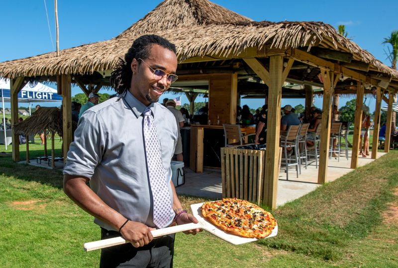 Chef Remy Williams of The Pointe Pizza shows off The Republic at Tiger Pointe Golf Club in Gulf Breeze Saturday, July 26, 2025.