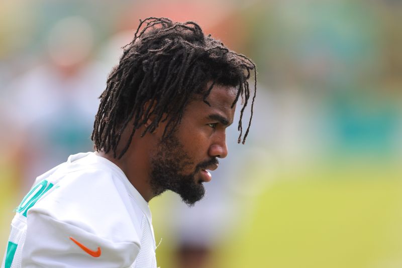 Jul 28, 2025; Miami Gardens, MI, USA; Miami Dolphins wide receiver Jaylen Waddle (17) looks on during training camp at Baptist Health Training Complex. Mandatory Credit: Sam Navarro-Imagn Images