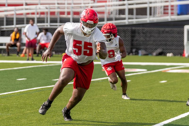 Michah “Champ” Smith (55) runs up the field during the first day of fall football practice at Vero Beach High School on Monday, July 28, 2025, in Vero Beach.
