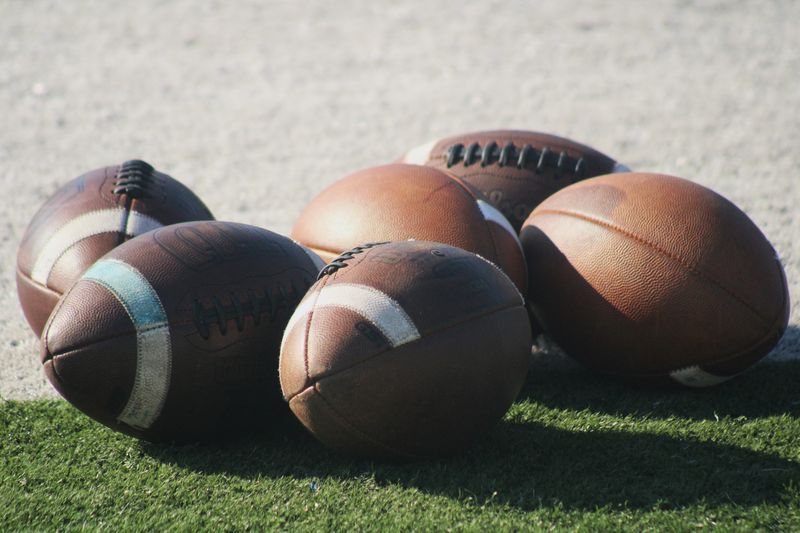STOCK | Footballs are displayed at Bolles School football practice on July 29, 2025, in Jacksonville, Florida. [Clayton Freeman/Florida Times-Union]