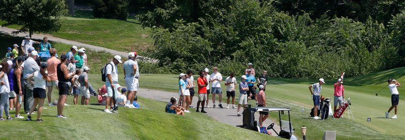 Spectators watch as Charlie Woods hits the ball Tuesday, July 29, 2025, during the Junior PGA Championship at the Purdue Birck Boilermaker Golf Complex in West Lafayette, Indiana.