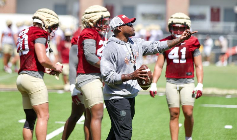 FSU football's assistant linebackers coach Ernie Sims coaches his players at the first practice of preseason camp on Wednesday, July 30, 2025