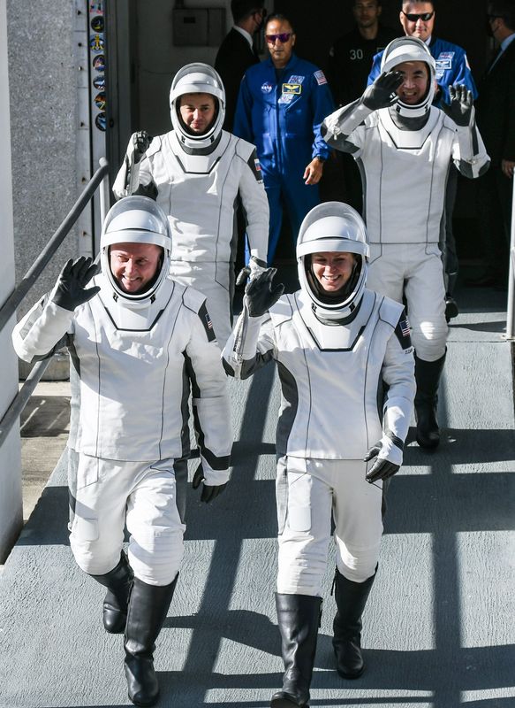 The astronauts of NASA’s Space X Crew-11 (front row from left: NASA astronaut Mike Fincke and NASA astronaut Zena Cardman; (back row) Oleg Platonov of Roscosmos and Kimiya Yui of JAXA (Japan Aerospace Exploration Agency) wave to family and media as they leave crew quarters at Kennedy Space Center, FL July 31, 2025. Crew-11 is scheduled to lift off just after noon eastern headed to the International Space Station. Craig Bailey/FLORIDA TODAY via USA TODAY NETWORK