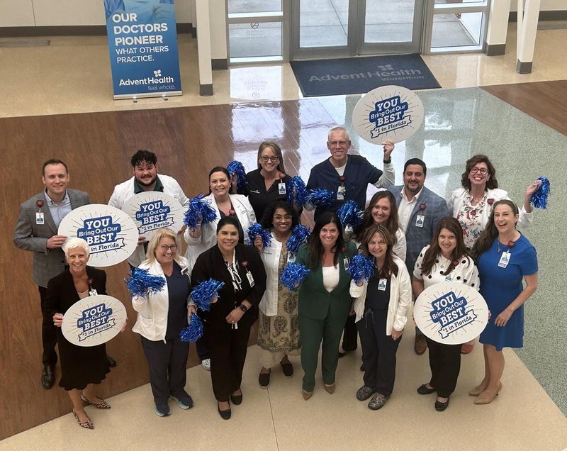 Medical personnel and executives celebrate new U.S. News & World Report Best Hospital rankings at AdventHealth Waterman.