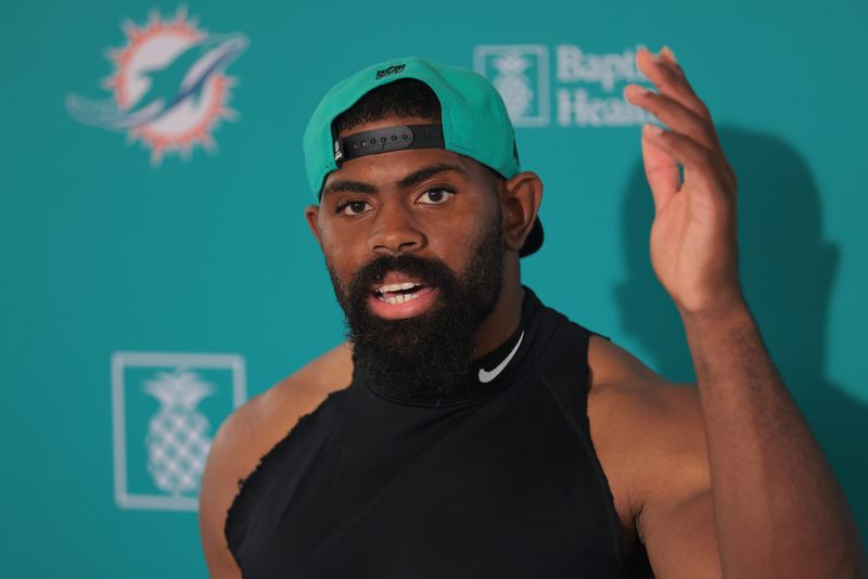 Jul 23, 2025; Miami Gardens, FL, USA; Miami Dolphins linebacker Jordyn Brooks (20) speaks to reporters during training camp at Baptist Health Training Complex. Mandatory Credit: Sam Navarro-Imagn Images