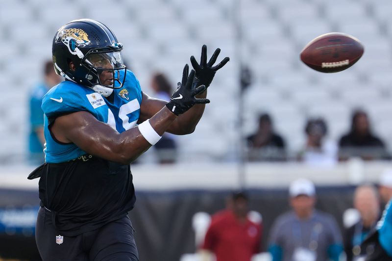 Jacksonville Jaguars tight end Quintin Morris (45) catches a pass during an NFL scrimmage event at EverBank Stadium, Friday, Aug. 1, 2025, in Jacksonville, Fla. [Corey Perrine/Florida Times-Union]