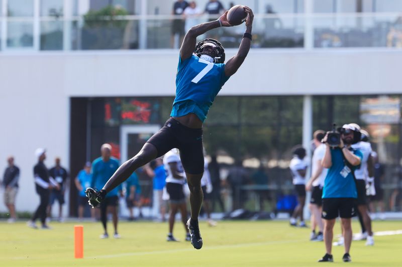 Jacksonville Jaguars wide receiver Brian Thomas Jr. (7) catches a pass during an NFL training camp session at the Miller Electric Center, Sunday, Aug. 3, 2025, in Jacksonville, Fla. [Corey Perrine/Florida Times-Union]