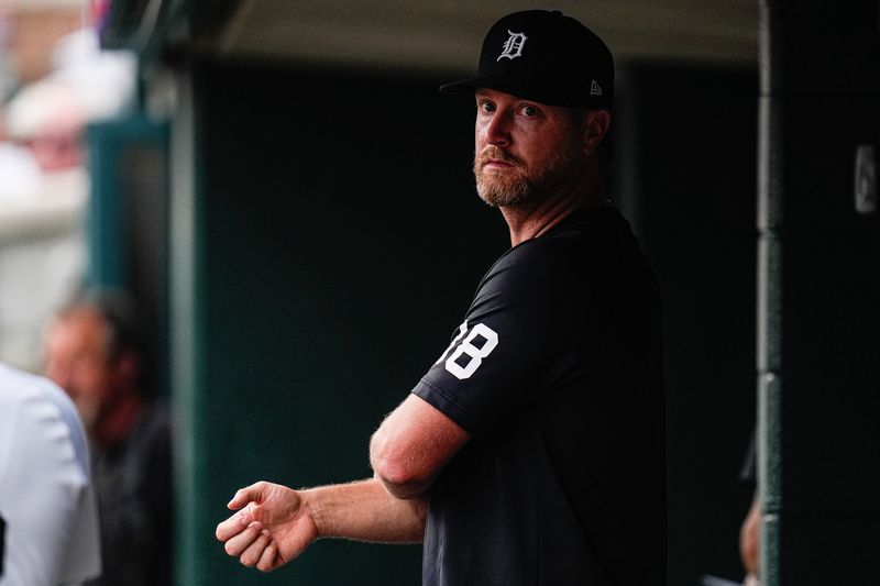 Detroit Tigers pitcher Alex Cobb watches a play from the dugout during the fifth inning against Minnesota Twins at Comerica Park in Detroit in Monday, August 4, 2025.