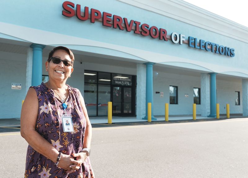 Edda Rosado, deputy supervisor of elections, stands in front of the new Volusia County Supervisor of Elections Office on Tuesday, Aug. 5, 2025, at 1588 North Woodland Blvd. in Deland.