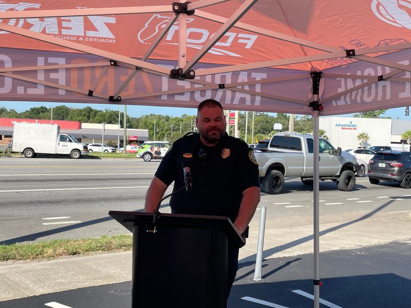 Belleview Police Lt. Michael Miley speaks during the annual "Stop on Red" event, which was held Aug. 6, 2025 at U.S. 301/441 in Belleview. Law enforcement and other officials use this event to encourage drivers to be careful, obey the rules of the road and stop at red lights.