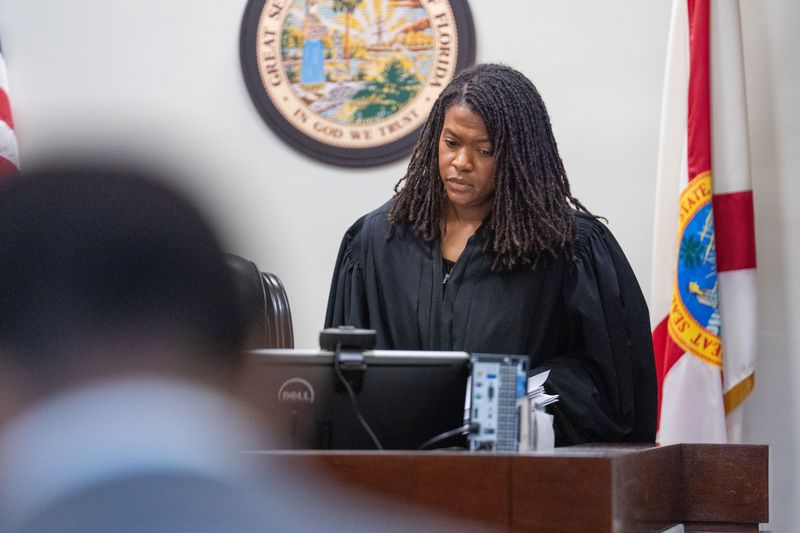 Judge Tiffany Baker-Carper enters the courtroom for the arraignment of Chloe Spencer, who is charged with murder, Thursday, Aug. 7, 2025.