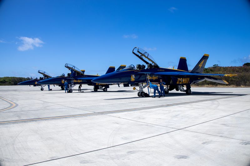 U.S. Navy Blue Angels pilots and crew members exit an F/A-18F Super Hornet after arriving at Marine Corps Base Hawaii on Aug. 4, 2025. The Kaneohe Bay Air Show will provide an opportunity to showcase the aircraft, equipment and capabilities of the armed forces in the Indo-Pacific region to the local community.