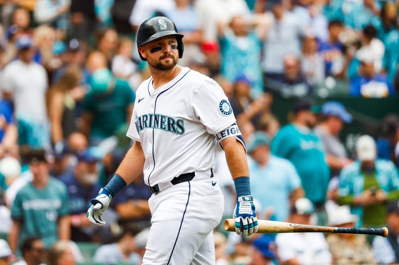 Seattle Mariners designated hitter Cal Raleigh (29) reacts after striking out looking Aug. 2, 2025, against the Texas Rangers to end the seventh inning at T-Mobile Park in Seattle, Washington. Mandatory Credit: Joe Nicholson-Imagn Images