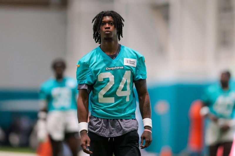 Jul 23, 2025; Miami Gardens, FL, USA; Miami Dolphins cornerback Cam Smith (24) looks on during training camp at Baptist Health Training Complex. Mandatory Credit: Sam Navarro-Imagn Images