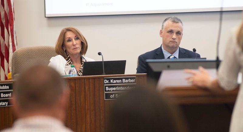Santa Rosa Superintendent of Schools Karen Barber and Board Attorney Terry Harmon listen to criticism during a public forum at the regular meeting on August 7, 2025. The Santa Rosa School District is under fire for its handling of the arrest of the Gulf Breeze Elementary vice principal's son.