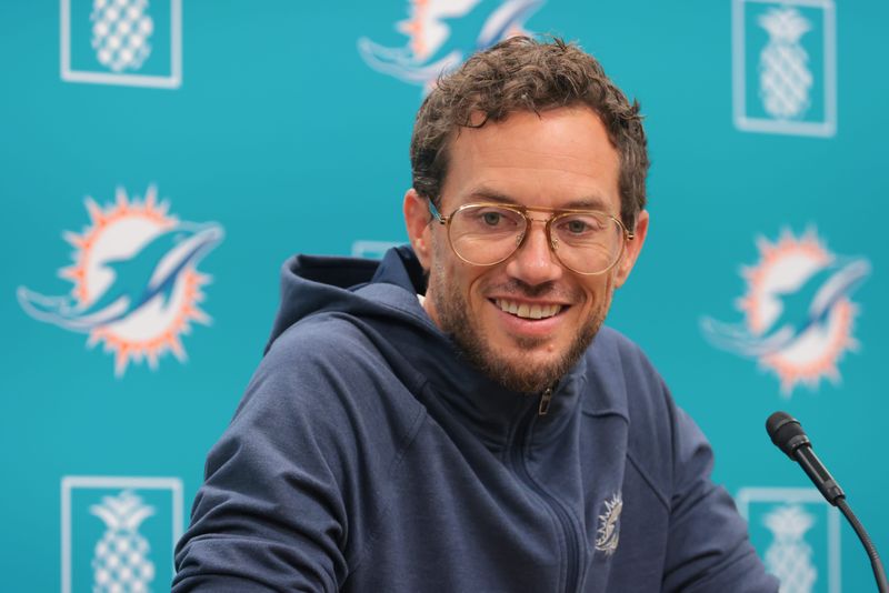 Jul 23, 2025; Miami Gardens, FL, USA; Miami Dolphins head coach Mike McDaniel speaks to reporters during training camp at Baptist Health Training Complex. Mandatory Credit: Sam Navarro-Imagn Images