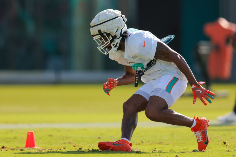 Jul 29, 2025; Miami Gardens, FL, USA; Miami Dolphins wide receiver Jaylen Waddle (17) works during training camp at Baptist Health Training Complex. Mandatory Credit: Sam Navarro-Imagn Images