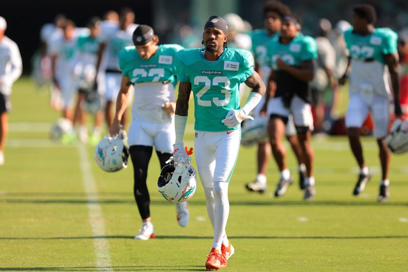 Jul 29, 2025; Miami Gardens, FL, USA; Miami Dolphins cornerback Jack Jones (23) runs on the field during training camp at Baptist Health Training Complex. Mandatory Credit: Sam Navarro-Imagn Images