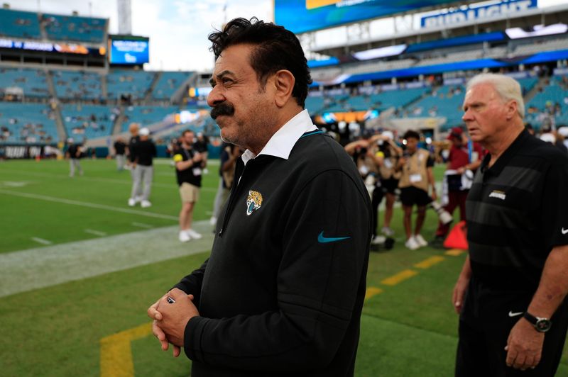 Jacksonville Jaguars owner Shad Khan walks on the field before an NFL preseason matchup at EverBank Stadium, Saturday, Aug. 9, 2025 in Jacksonville, Fla. [Corey Perrine/Florida Times-Union]