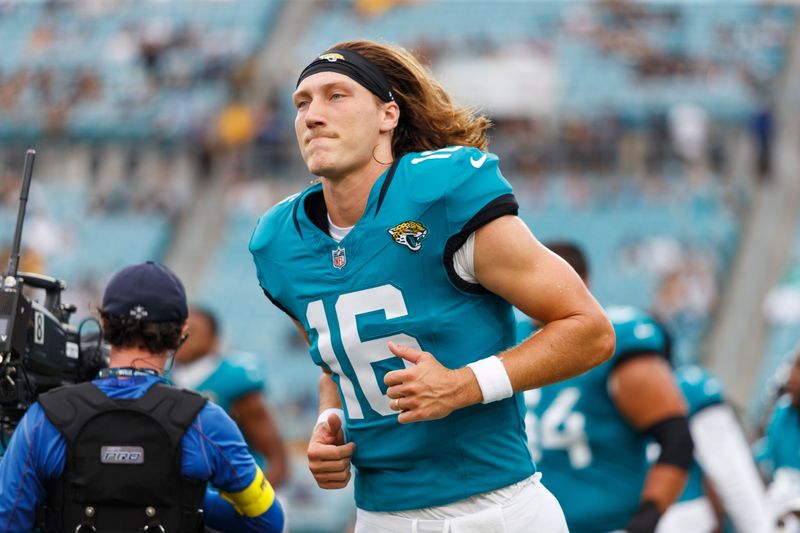 Aug 9, 2025; Jacksonville, Florida, USA; Jacksonville Jaguars quarterback Trevor Lawrence (16) during the warm ups before the game against the Pittsburgh Steelers at EverBank Stadium. Mandatory Credit: Morgan Tencza-Imagn Images