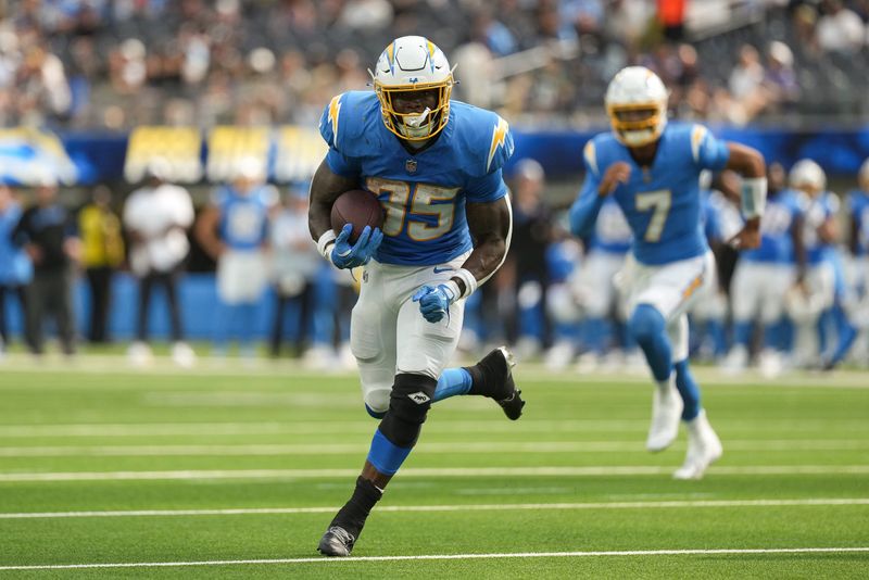 Aug 10, 2025; Inglewood, California, USA; Los Angeles Chargers running back Raheim Sanders (35) runs the ball for a touchdown in the fourth quarter against the New Orleans Saints at SoFi Stadium. Mandatory Credit: Jon Endow-Imagn Images