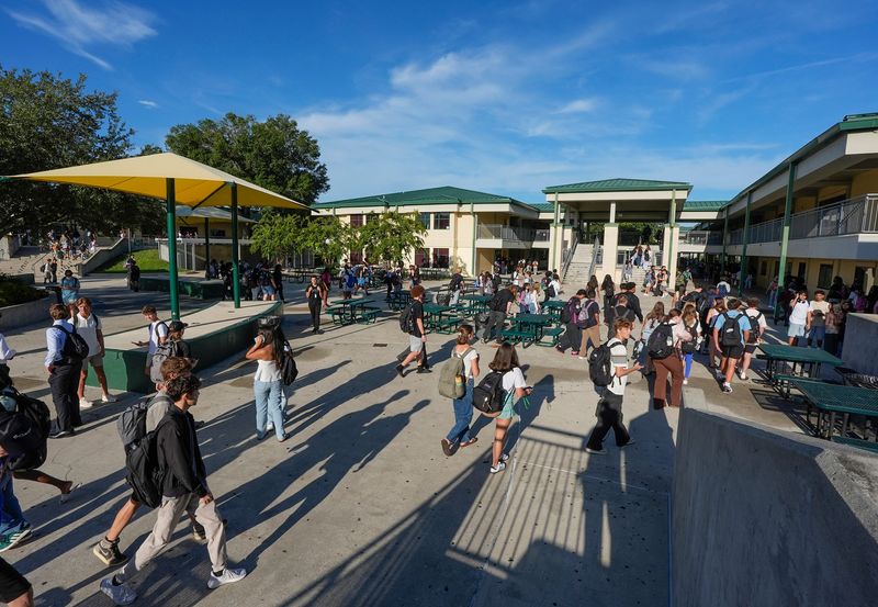 Students head to classes on the First day of school at DeLand High School, Monday, August 11, 2025.