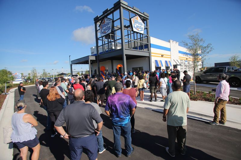 "Cravers," local officials, media and other VIPs showed up to ribbon-cutting of the new White Castle that opened on Collina Avenue in Clermont on Tuesday, Aug. 12, 2025.