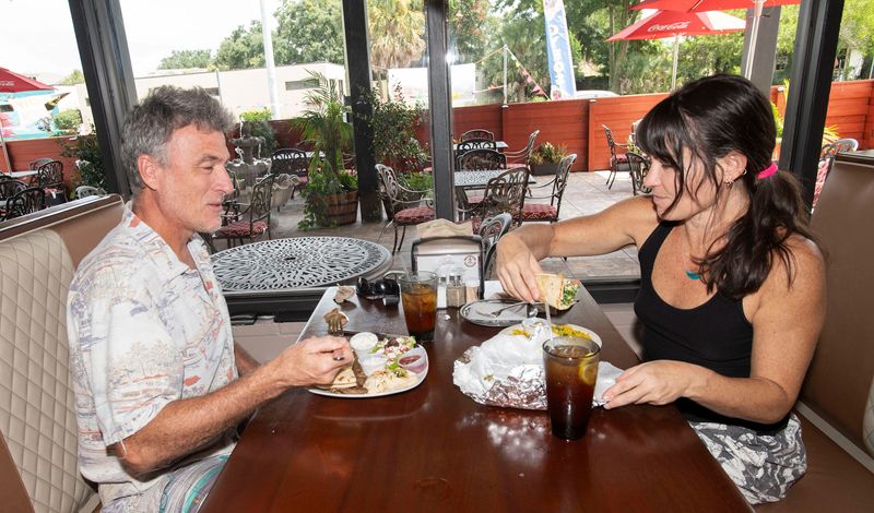 Steve and Kara Struck enjoy a meal at the new Jordan Valley Restaurant location on Barrancas Avenue on August 12, 2025.