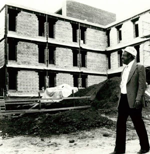 Jack Gant, Florida State University's first Black male faculty member, surveys construction of the Stone Building on campus.