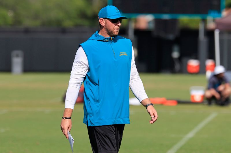 Jacksonville Jaguars head coach Liam Coen looks on during an NFL training camp session at the Miller Electric Center, Thursday, Aug. 14, 2025 in Jacksonville, Fla.