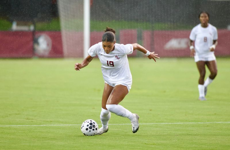 FSU soccers Kameron Simmonds dribbles forward against the University of Florida on Thursday, Aug. 14, 2025 at the Seminole Soccer Complex.