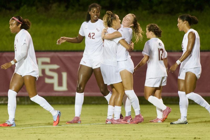 FSU soccer players celebrate a goal against the University of Florida on Thursday, Aug. 14, 2025 at the Seminole Soccer Complex.