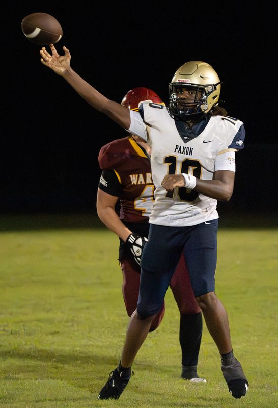 Paxon quarterback Javier Dixon (10) throws a pass under pressure against West Nassau. Paxon is one of five Jacksonville-area teams scheduled to compete in the new FHSAA Independent Football League for 2026.