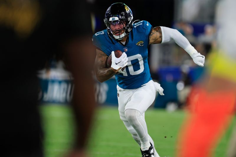 Jacksonville Jaguars wide receiver Eli Pancol (10) rushes for yards during the fourth quarter of an NFL preseason matchup at EverBank Stadium, Saturday, Aug. 9, 2025 in Jacksonville, Fla. The Steelers defeated the Jaguars 31-25. [Corey Perrine/Florida Times-Union]