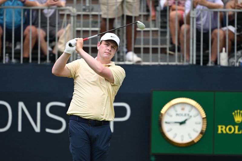 Robert MacIntyre watches his tee shot on the first hole during the third round of the BMW Championship golf tournament.