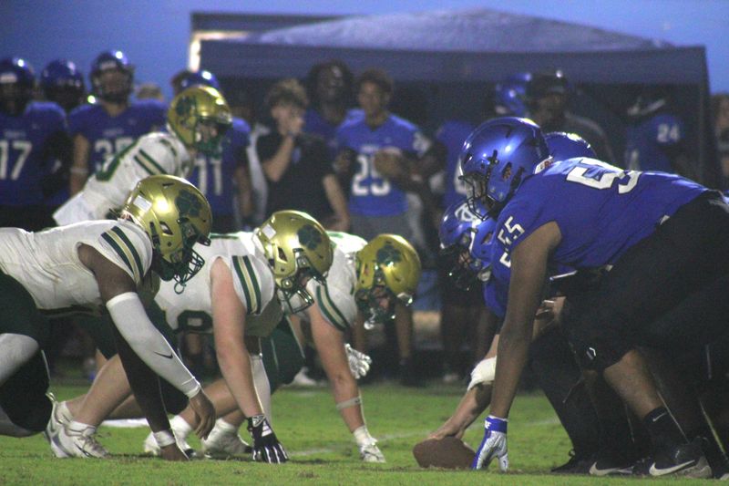 Nease and Trinity Christian linemen face off across the line of scrimmage during a high school football kickoff classic on Aug. 15, 2025.