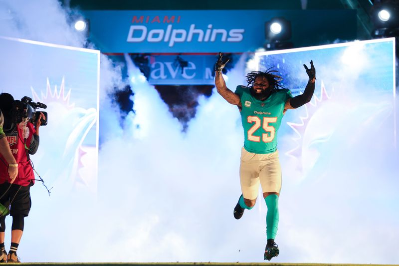 Dec 11, 2023; Miami Gardens, Florida, USA; Miami Dolphins cornerback Xavien Howard (25) takes to the field prior to the game against the Tennessee Titans at Hard Rock Stadium. Mandatory Credit: Sam Navarro-USA TODAY Sports