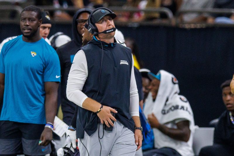 Aug 17, 2025; New Orleans, Louisiana, USA; Jacksonville Jaguars head coach Liam Coen walks the sidelines against the Jacksonville Jaguars during the second half at Caesars Superdome. Mandatory Credit: Stephen Lew-Imagn Images