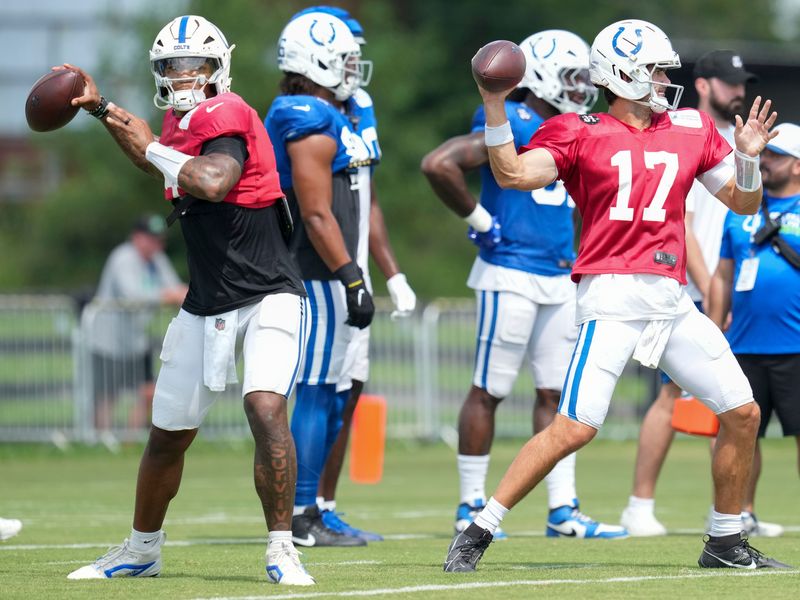 Indianapolis Colts quarterback Anthony Richardson Sr. (5) and quarterback Daniel Jones (17) throw the ball Thursday, Aug. 14, 2025, at a joint practice with the Green Bay Packers during training camp at Grand Park in Westfield.