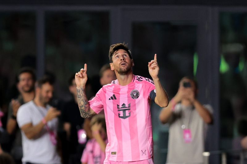 Inter Miami CF forward Lionel Messi (10) celebrates after scoring against Los Angeles Galaxy during the second half at Chase Stadium.