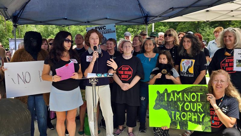 Bella Schwartz speaks during an Aug. 13, 2025, press conference announcing a lawsuit challenging the state's approval of a black bear hunt in Florida in December.