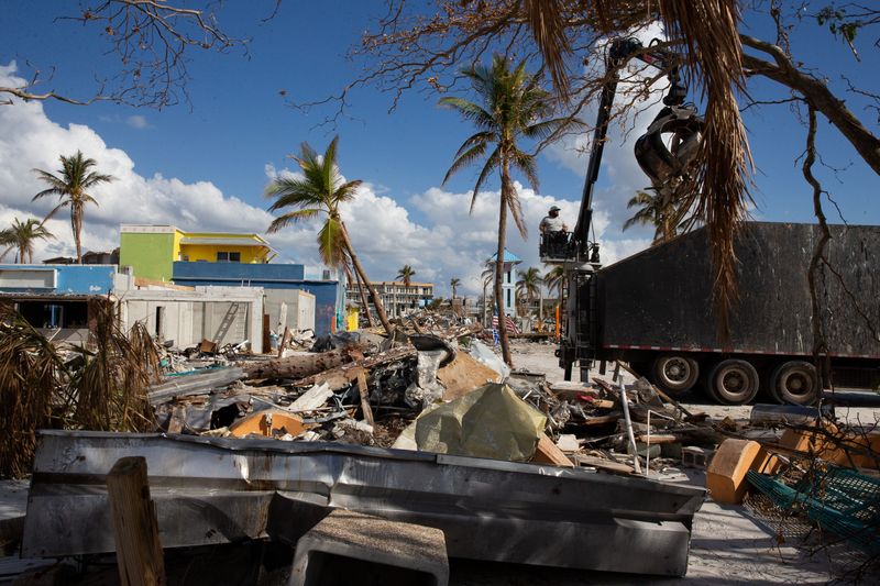 FILE PHOTO from Oct 19, 2022. Clean up efforts are still in full swing at Times Square on Fort Myers Beach more than a month after Hurricane Ian devastated the island. Photographed during a tour with Fort Myers Beach Mayor Ray Murphy.