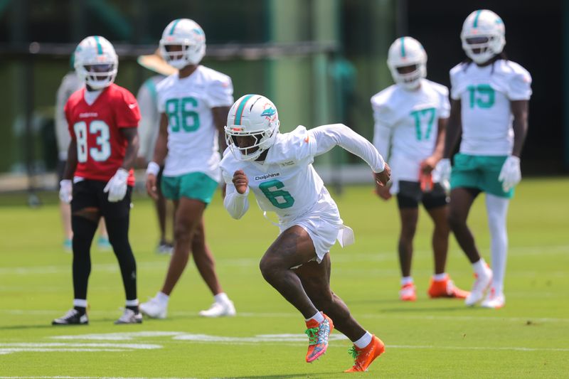 Jun 10, 2025; Miami, FL, USA; Miami Dolphins wide receiver Malik Washington (6) practices during mandatory minicamp at Hard Rock Stadium. Mandatory Credit: Sam Navarro-Imagn Images