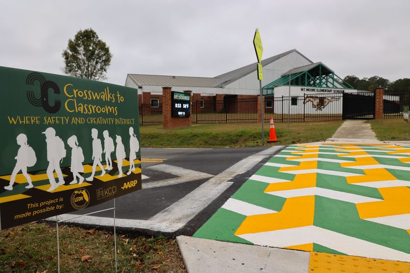 Crosswalk on Dempsey Mayo Road in W.T. Moore School created by students and seniors as the design collaborators.
