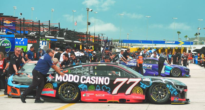 Nascar Cup Series teams move their cars in the gargae area before qualifying, Friday August 22, 2025 at Daytona International Speedway.