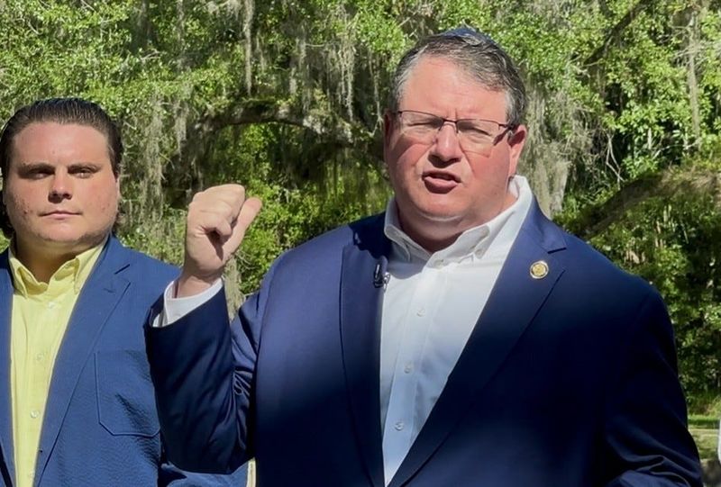 Congressman Randy Fine, a Florida Republican, speaks at Juniper Springs Recreation Area about his proposal to transform Ocala National Forest into Florida Springs National Park. The plan aims to offer additional protections for springs, which environmentalists say are ailing under the weight of development.