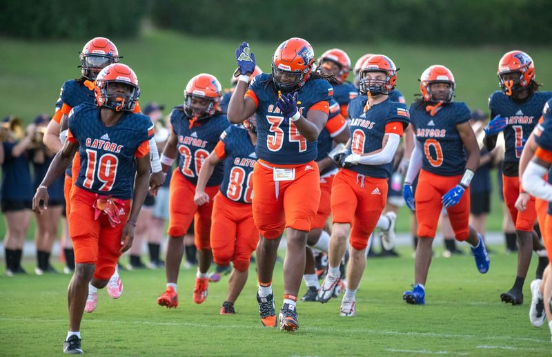 The Gators take the field for the West Florida vs Escambia football game at Escambia High School in Pensacola on Aug. 25, 2025.