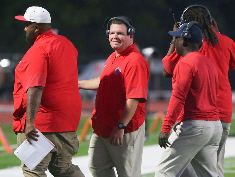 Vikings head coach Josh Pulliam walks the sideline during the Fort Walton Beach - South Walton football game at The Nest in South Walton.
