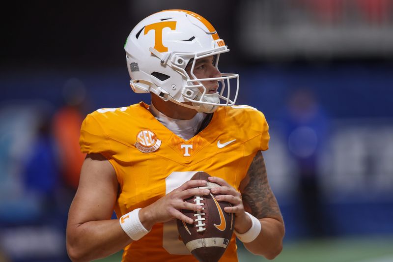 Aug. 30, 2025; Atlanta, Georgia; Tennessee Volunteers quarterback Joey Aguilar (6) warms up before a game against the Syracuse Orange at Mercedes-Benz Stadium.